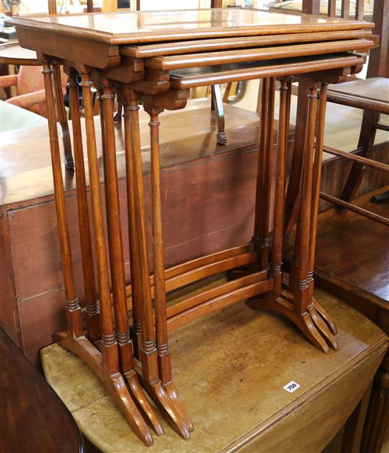 A nest of satinwood quartetto tables